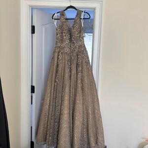 Size 12 Jovani lace gown with floral embroidered pearl and jewels.